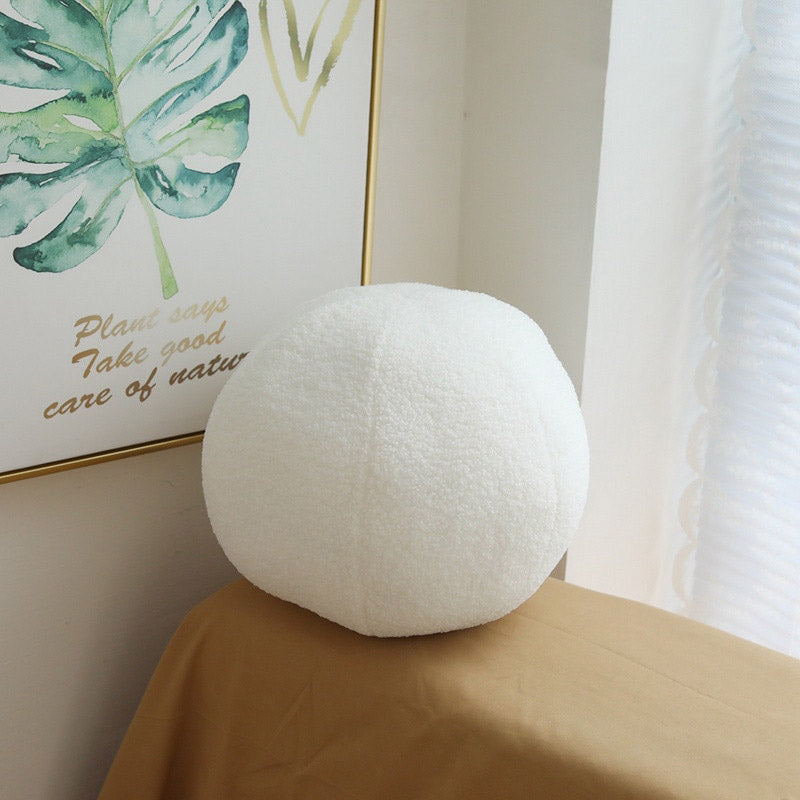 white-round-ball-cushion